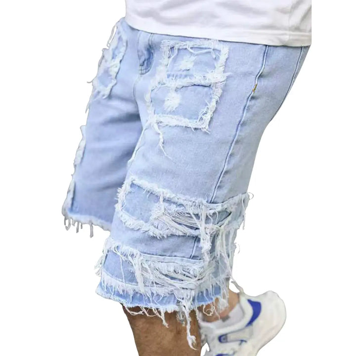 DISTRESSED DENIM SHORTS